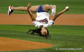 Olympic gold medalist Hezly Rivera does incredible flip to throw the first pitch at the Rangers game