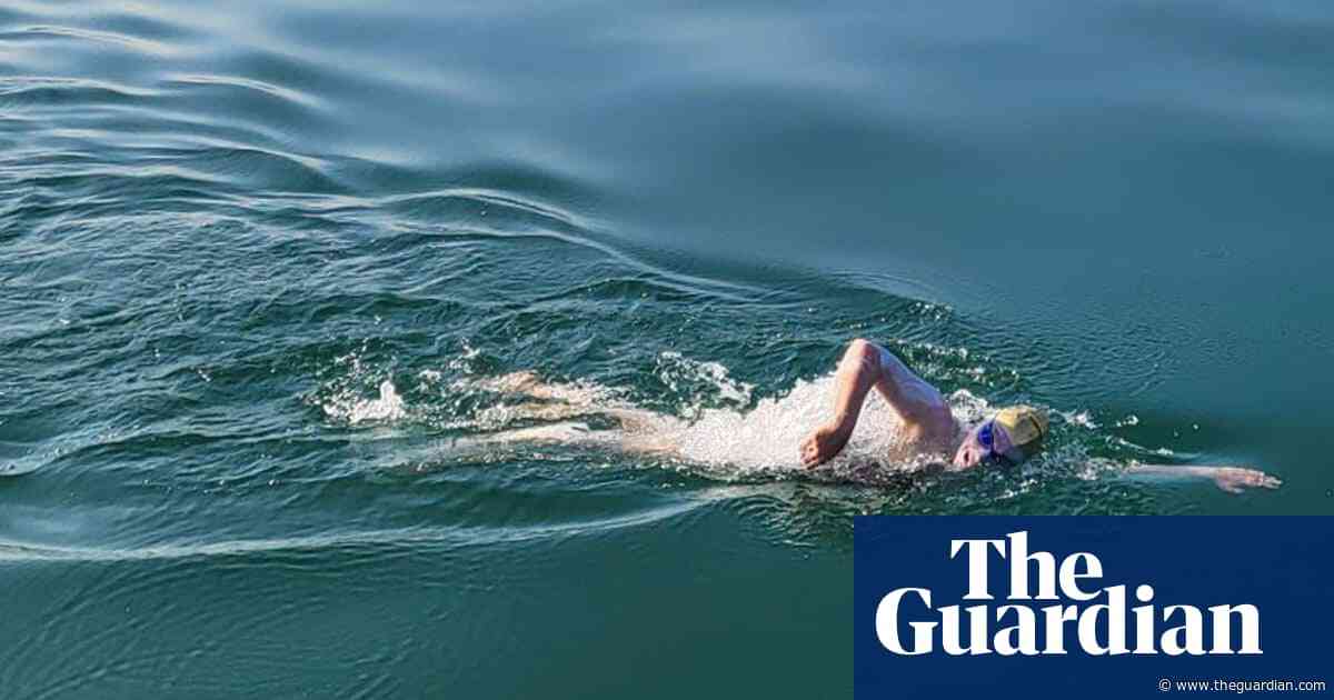 Britain's Sam Farrow claims women’s record for Lake Geneva crossing – video