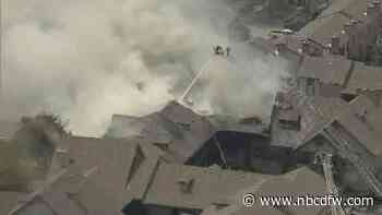 Fire causes partial roof collapse at Dallas apartment complex