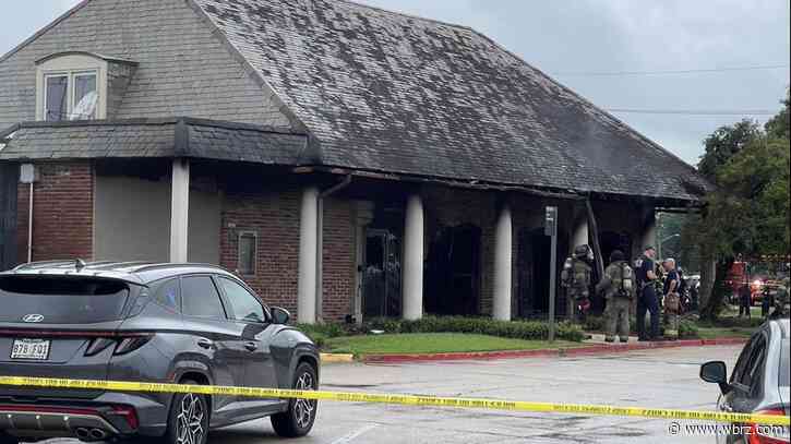 Vehicle on fire after crashing into bank on Airline Highway; officials say one person died on scene