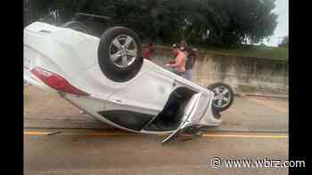 Traffic slowed on I-110 near Governor's Mansion after car flips onto roof; reason unclear