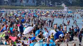 Menschen genießen Sommerwetter an Nord- und Ostsee