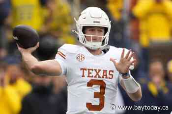 Quinn Ewers throws for 3 touchdowns as No. 3 Texas pounds No. 10 Michigan 31-12