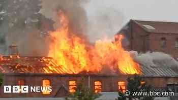 Roads closed as fire raged in town centre