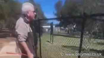 Aussies divided over wild footage of dog owners clashing outside a park - so who is to blame?