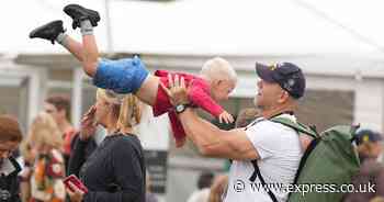 Mike Tindall seen in sweet moment with son Lucas as he swings him through the air