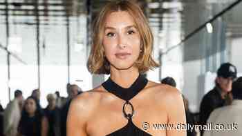 Whitney Port sizzles in a sexy black dress as she leads stars at Jonathan Simkhai show during NYFW