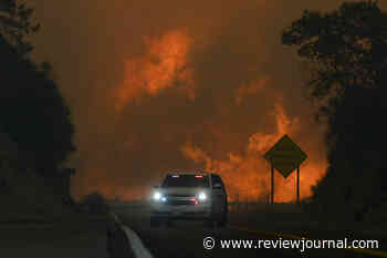 Evacuations ordered as wildfire burns in foothills of national forest east of LA