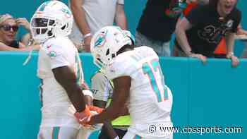 Dolphins' Tyreek Hill tags 80-yard TD with handcuff celebration after being detained by police before game