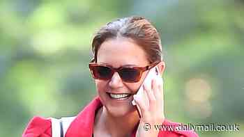 Katie Holmes looks giddy in NYC as she embraces life without Suri after ex Tom Cruise paid her college tuition fees