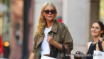 Gwyneth Paltrow looks effortlessly stylish in a cropped trench coat and cargo pants as she stocks up on her Goop products in New York City