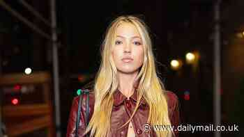 Lila Moss flashes her midriff in a bra top and cropped leather jacket at Fashion Week dinner in New York City