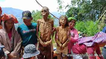 A clean death: Dead bodies are removed from their graves so they can be spruced up and given new clothes by their loved ones as part of Indonesian tradition