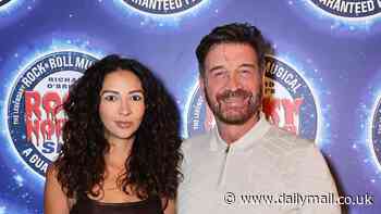 Nick Knowles, 61, puts on a loved-up display with fiancée Katie Dadzie, 34, as they attend the opening of The Rocky Horror Show in London's West End days ahead of his Strictly debut