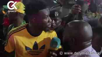 Andre Onana is mobbed by hundreds of Ugandan fans as Man United goalkeeper leaves stadium separate from team after Cameroon's stalemate with Zimbabwe