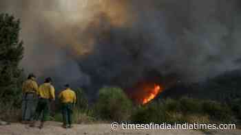 Giant plumes of smoke dot Southern California skies as crews fight several major wildfires