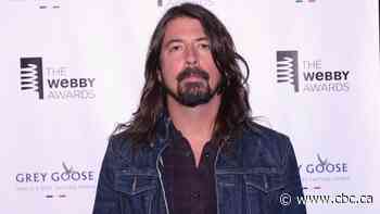 Dave Grohl says he's father to new daughter born outside of his marriage