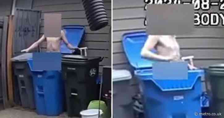 Bizarre moment naked man in a garbage bin is busted as ‘car thief’