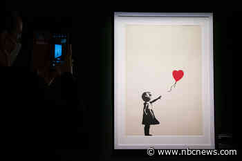 Two charged with stealing Banksy artwork 'Girl with a Balloon' from London gallery