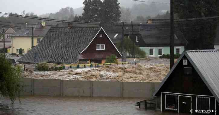 ‘Catastrophic’ moment entire town is submerged in water after dam bursts