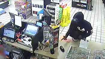 Video shows armed robbery at Tampa Circle K, police searching for suspect