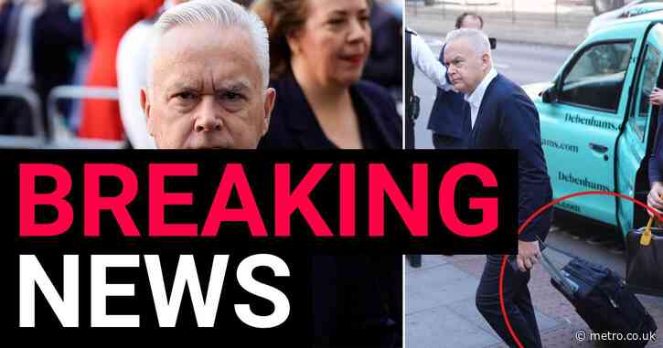 Huw Edwards pulls suitcase as he arrives at court to be sentenced