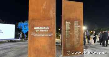 Iraq unveils tribute to "Guardians of Truth," including 2 of CBS News' own