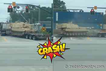 WATCH: Train Collides With Military Tank Being Hauled on a Semi