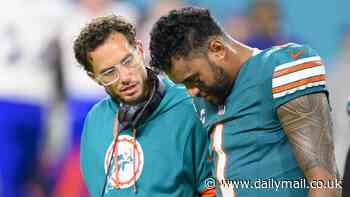 Tua Tagovailoa is 'smiling with his teammates' and 'working with trainers and medical staff,' Dolphins coach Mike McDaniels says after QB suffered his third career concussion