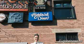 Iconic Canadian singer k.d. lang honoured by Edmonton’s Neon Sign Museum