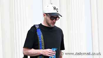 Justin Timberlake pictured for the first time since pleading guilty to DWI as he keeps low-profile with cap and shades