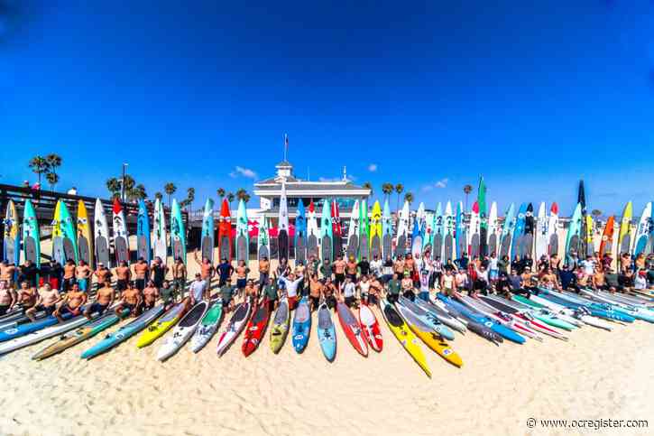 About 90 paddlers cross Catalina Channel, raise $230,000 for lifeguard’s legacy