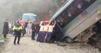 Machu Picchu crash horror as bus filled with tourists plunges 50 feet down cliff