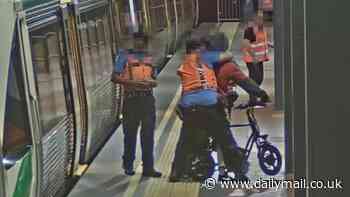 Wild moment cyclist is tackled to the ground by Perth transit officers at train station