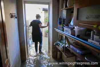 Residents of a Czech town face hard recovery after massive flooding