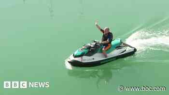 Lib Dem leader arrives at conference by jet ski