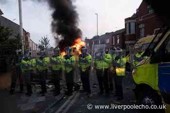 Merseyside's youngest rioter appears at court in his school shoes after handing himself in to police