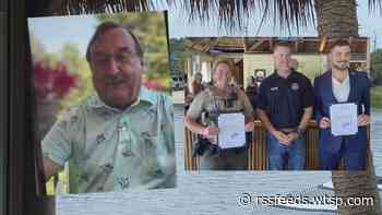 Bartender, FWC officer honored for saving man from car sinking in water