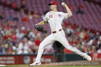 Reds pitcher Brandon Williamson departs in the 2nd inning with an apparent injury