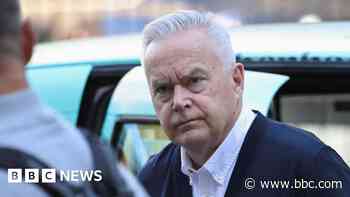 Watch: Silent Huw Edwards walks into court building