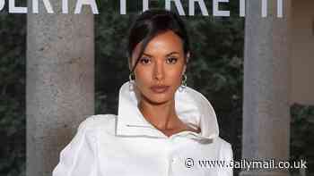 Maya Jama looks effortlessly chic in an oversized white shirt dress as she attends the Alberta Ferretti show at Milan Fashion Week