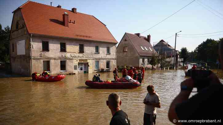 Actie NAC-supporters na overstromingen in Polen, vanwege speciale band