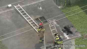 Video shows smoke rising from roof as firefighters battle house fire in Miramar