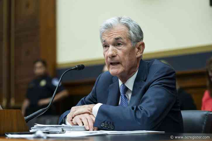 Federal Reserve cuts key interest rate by a half-point