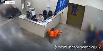 Jail inmate is caught on camera crawling by unsuspecting guard to get to female side where he tried to assault a woman