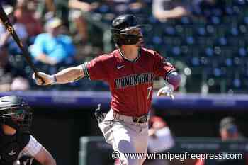 Carroll homers twice and Rodriguez strikes out 11 in Diamondbacks’ 9-4 victory over the Rockies