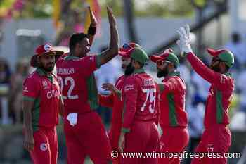 Oman holds on to edge Nepal with one ball to spare in cricket thriller