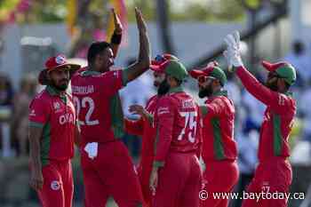 Oman holds on to edge Nepal with one ball to spare in cricket thriller