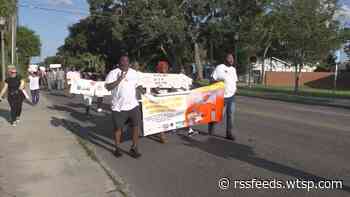 Community hosts walk in St. Pete to shed light on gun violence