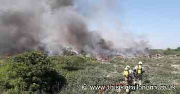 Road closed as former Rainham landfill site on fire again